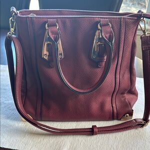 Burgundy Leather Satchel with Gold Hardware and Adjustable Strap